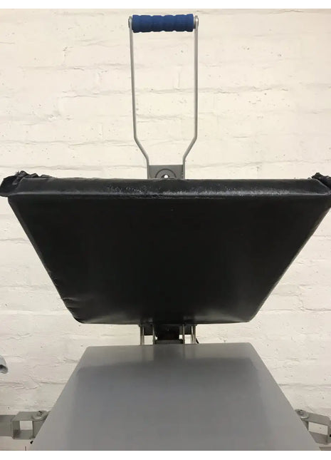 Rapid Slip Heat Press Upper Platen Cover 16X20 by DTG Printer Parts, black vinyl cover with steel frame and blue handle.