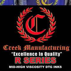 Creek Manufacturing ink bottles with logo and text on a black background