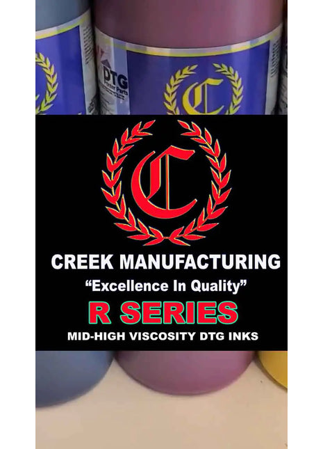 Creek Manufacturing ink bottles with logo and text on a black background