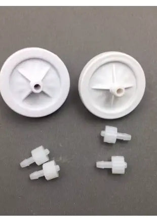 DTG/DTF Ink Filter White + CMYK by DTG Printer Parts: white plastic wheels with cross spokes and tiny fittings for flow ink