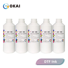 OKAI DTF INK bottles: white jugs, color labels, cyan magenta yellow black text, glossy finish, DTG Printer Parts branding